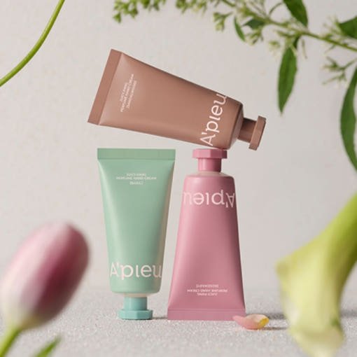 A'piew Juicy Pang Perfume Hand Cream 30ml #Basil in pastel green tube emphasizing deep hydration benefits