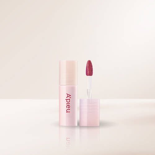 A'pieu Juicy Pang Dewy Glow Tint Mini 2g (3 Colors) with hydrating formula and deep pink applicator wand visible