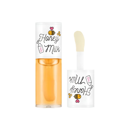 A'pieu Honey & Milk Lip Oil 5g (3-type) with clear golden oil and doe-foot applicator for moisture-locking care