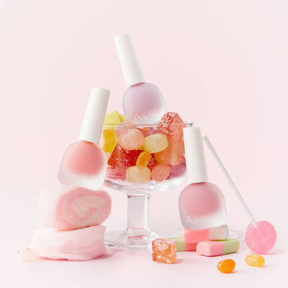 A'pieu Juicy Pang Water Blusher 9g with vibrant color in frosted bottles styled with pastel candies and sweets
