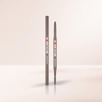 A'pieu Born To Be Madproof Skinny Brow Pencil #01 Dark Brown with dual-ended precision tip and spoolie brush on soft beige background