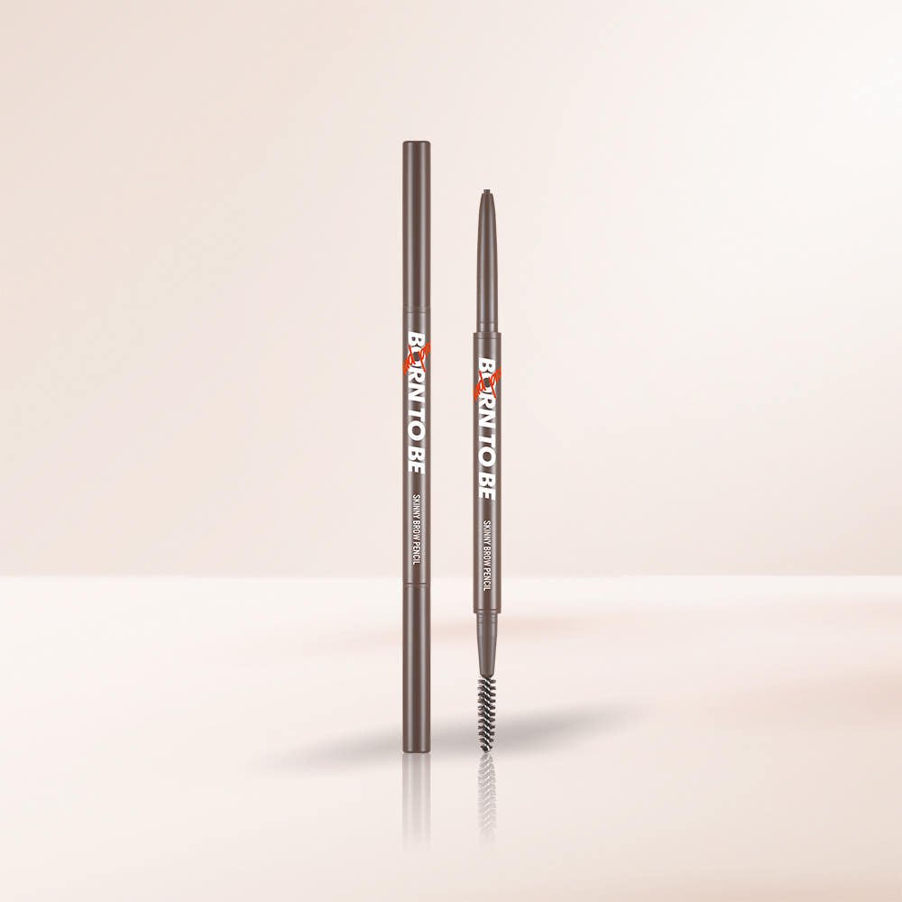 A'pieu Born To Be Madproof Skinny Brow Pencil #01 Dark Brown with dual-ended precision tip and spoolie brush on soft beige background