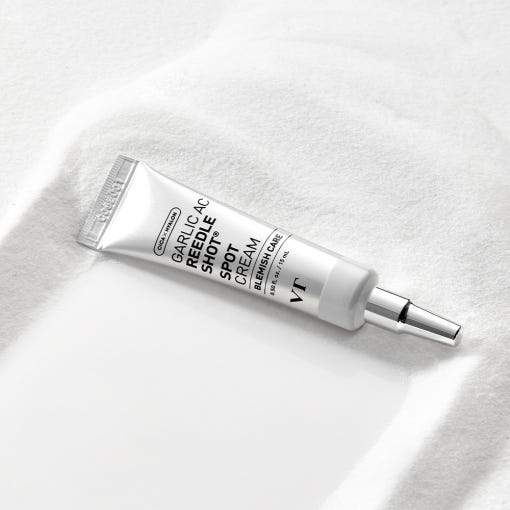 VT Garlic AC Reedle Shot Spot Cream 15ml in white and silver tube for powerful blemish care on light textured surface