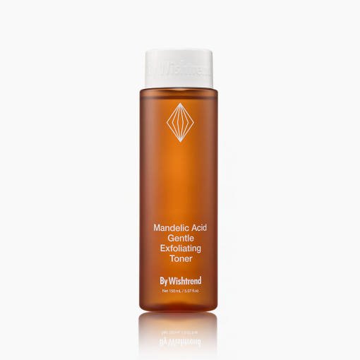 Amber bottle of gentle exfoliating toner with white cap and minimal white logo on a plain background