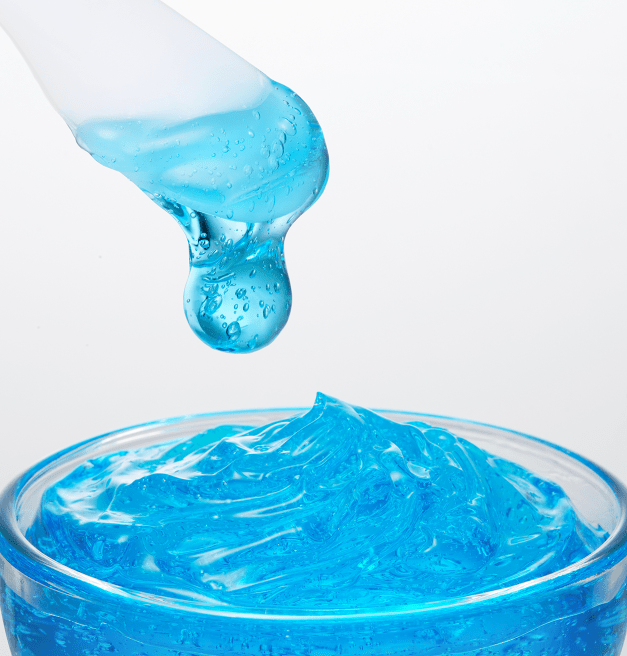 medicube Hyaluronic Ceramide Jelly Cream 50ml vibrant blue gel texture with deep hydration on clear spatula above jar