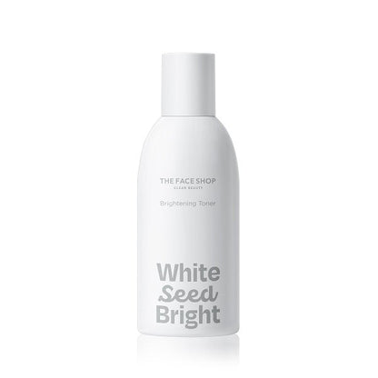 Minimalist white bottle of brightening toner with clean label emphasizing seed and bright effects on plain background