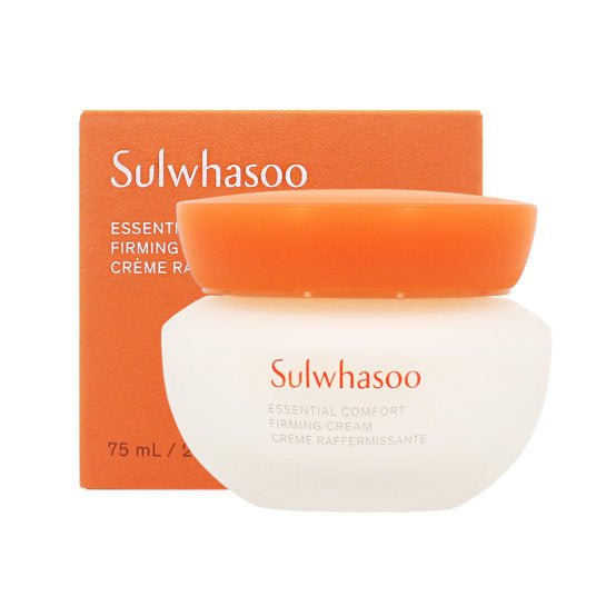 Matte white jar with an orange lid containing firming cream, placed in front of matching orange packaging box