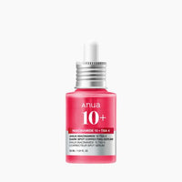 Anua Niacinamide 10% + TXA 4% Dark Spot Correcting Serum 30ml brightens skin in a pink dropper bottle.