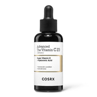 Black dropper bottle labeled Advanced Vitamin C serum with Super Vitamin E and hyaluronic acid benefits
