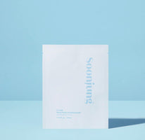 A white rectangular skincare packet with the brand name 'soojung' printed vertically in light blue, set against a solid light blue background.
